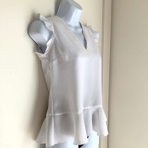 white ruffle v neck blouse